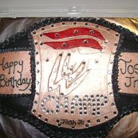 Wrestling Champ Belt butter cake with buttercream frosting, fondant accents! It was a fun first!