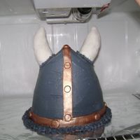 The Viking! A delicious chocolate cake with buttercream frosting, rice crispy treat horns with fondant. Afirst in the 3D hat department. It's what...