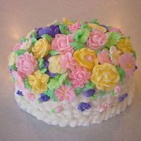 Basket Weave With Flowers Had been making all the flowers in this class and decided to load the cake up.