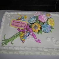 Cupcake" Bouquet" Shower Cake What more fitting for a Bridal Shower that a "Bride's Bouquet". Fancy flower cupcakes top this sheet cake, accented with...