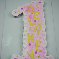 First Birthday Cupcake Cake Cupcakes arranged as a #1. Iced with buttercream and accented with fondant.