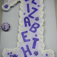 Purple First Birthday Cupcake Cake Cupcakes iced with buttercream and accented with fondant