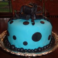 Blue/black Birthday Cake W/ Bow First time making a fondant bow...think it turned out ok or at least better than I expected.