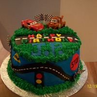 Cars This is a cake done for a child that LOVES the movie CARS. Thanks for looking