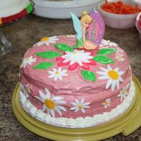 Tink Done for my niece's 2nd birthday. Cake is french vanilla covered in strawberry buttercream and filled with BC and fresh strawberries....