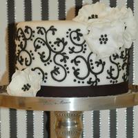 Black & White Black & White cake with scrollwork.I