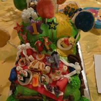 Winnie The Pooh Birthday Picnic First Birthday Cake This is a Winnie the Pooh first birthday cake I did for my nephew's son. They wanted Winnie the Pooh. I decided to do a birthday...