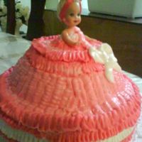 Dsc00120.jpg This is my 1st try at a doll cake ,it was a last minute order and i did not have the correct doll ,but I used one i had at home