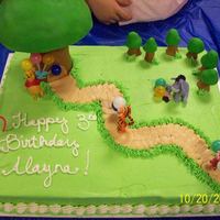 Pooh Bear I loved this cake. I made it for a very special girl, that loved it very much. The tree is Styrofoam, and was a little top heavy. That'...