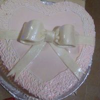Heart Cake An extremely feminine V-Day cake I made for my boyfriend lol..this was the first bow I ever made, Im pretty pleased with it