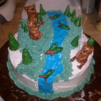 Beary Happy Bears, fish and trees are gumpaste and painted with luster dust and vodka, water is colorflow. Chocolate cake with buttercream