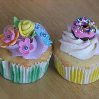 Bake Sale Cupcakes Made a bunch of these for school bake sale. Heavily influenced by ShamsD and Zalitas on Flickr. Confetti cake with buttercream and fondant...