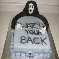 Watch Your Back! For a friend's dad's birthday. He was upset when he turned 30. Nuff said.Chocolate cake with cream filling, covered in fondant....