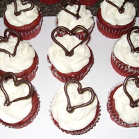 Cupcakes red velvet cake/cream cheese frosting/ hearts made with dark chocolate