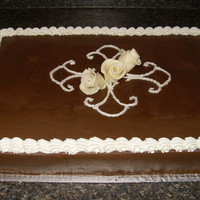 Just For Fun chocolat cake and icing with white modelling chocolate roses