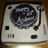 Dj Turntable I made this cake for my son's 25th birthday party. I used a straw to make the arm and covered it with fondant.