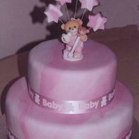 Pink Marbled Christening Cake This is the girl's version of the blue christening cake I made. Covered in fondant, ceramic bear ornament.