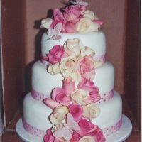 Fresh Roses Wedding Cake This was my first ever attempt at fresh flowers. It turned out really well and has been a very popular cake since!! Fondant covered and...