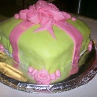 Pink & Green Ribbon Gift Cake This was my first time using fondant, I was facinated of what you can do with fondant, so I made MM fondant on a vanilla cake just using...