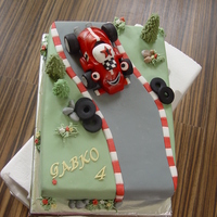 Roary The Racing Car this cake was made for my son's best friend, so my son (4 1/2 y) helped a little bit :)) he created the tyres near the road. Anyway I...