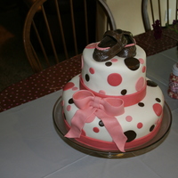 Pink & Brown Polka Dot Baby Shower Cake I made this for my sister in law's baby shower. It is my 4th fondant covered cake. Shoes were made using a pattern from this site.