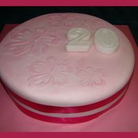 Hawaiian Theme Hibiscus the hibiscus flowers are made by using stencil. I made them out of xray film from a picture I found. I used 3 different sizes. once cake...