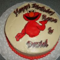 L_E170Bf2D5B2D4929B444Bb15D4Eb.jpg almond butter cake with imbc . elmo and wording are E.I.
