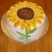 Sunflower Leaves made of fondant, seeds are piped chocolate icing. TFL!