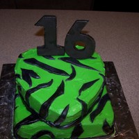 Zebra 16 Fun Fettie cake, buttercream frosting, fondant zebra stripes and Molded chocolate 16