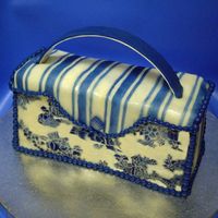 Toile Purse My first attempt at a purse cake. Fondant covered with stencils.
