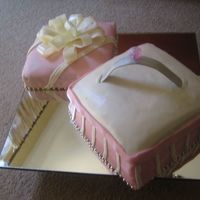 Engagement Ring Box White chocolate mud cake covered in white chocolate sugarpaste. The ring is made out of flower paste and the "diamond" is plastic...