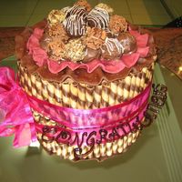 Chocolate Truffle Engagement Cake The cake is chocolate sponge with buttercream, topped with homemade truffles and a chocolate sugarpaste ruffle.