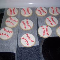 Baseball Cookies NFSC, MMF, buttercream stitching. Need to learn how to do the whole royal icing thing. Made for my sons baseball game (which was cancelled...