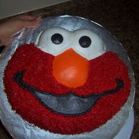 It's Elmo! My first character cake, i didn't do the star tips, but make him look 'hairy' by using the grass tip. So fun to make! Next...