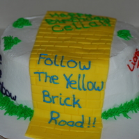 Oz Birthday A friend wanted a wizard of oz cake for his wife. This is what I came up with. The 'road' is fondant.