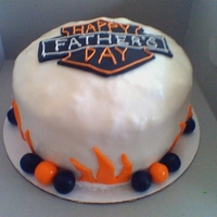 Harley Davidson Cake I made this cake for my dad's birthday. Fondant with MMF accents