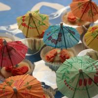 Hawaiian Theme fondant flipflops on top of royal icing and soft brown sugar