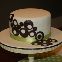 Samantha I made this cake for a friend of the family as a congratulations cake. Inspiration from a cake by Sweetcakesbyrebecca.