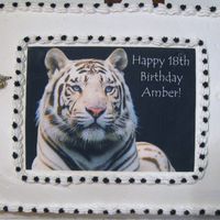White Tiger Birthday Cake Made this cake for my Daughter's 18th Birthday . White Tigers are her favorite animals . All buttercream icing with an edible print ....