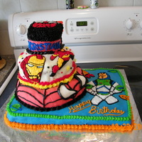 Super Hero Cake I made this for my son's 4th birthday. He loves all the characters, Buzz Lightyear, Spiderman, Iron man and Transformers. There were a...