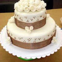 Tier.jpg fondant class final cake, MMF, roses are regular fondant, cake was devils food cake and french vanilla cake filled with chocolate and...