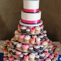 Hot Pink & Navy Blue Cupcake Tower 8 dozen regular sized cupcakes & 8 dozen mini cupcakes6" red velvet & 8" carrot stacked cutting cakes with IMBC