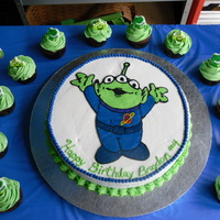 Toy Story Alien Birthday Cake Frozen buttercream transfer, 12 inch round chocolate cake, coordinating cupcakes