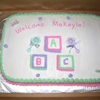 Img_2122.jpg Cake done for my sisters shower at her work. Yellow cake BC icing