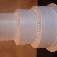 Engagement Cake A simple wasc with buttercream, swiss dots and super pearl for decoration. Can't make the picture "rotate" sorry :(