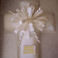 First Communion Cross Cake I was so happy to do this cake as it is probably one of the prettiest ones i have had a customer request for a First Communion. It's a...