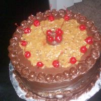 Cherry German Chocolate This cake is a German Cherry Cake it was all German but the customer wanted cherry Filling and top with Cherries!!
