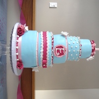 First Birthday My daughter's first Birthday Cake. 5 tiers, ribbon roses, butterflies and buttons.