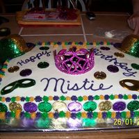 Mardi Gras Ball Birthday Cake White cake with strawberry filling and buttercream icing. Was doen for my god child' 16th birthday. She had a Mardi Gras ball for her...
