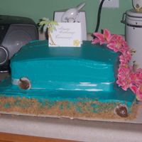 Hawiian Cake a hawiian cake for my daughters 11th birthday...buttercream,box cake & decorative flowers